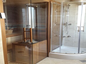 Villa | Bathroom | Shower, hair dryer, towels