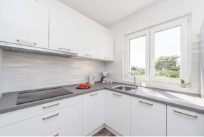 Apartment | Private kitchen | Highchair, cookware/dishes/utensils - Modern Apartment in Pakostane With Barbecue (Pakostane)