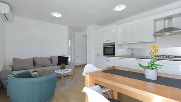 Villa | Private kitchen | Dining tables
