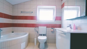 Villa | Bathroom | Bathtub, towels