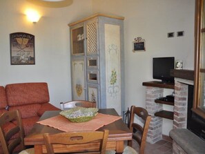 Ferienhaus | Wohnzimmer | Kamin