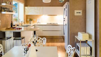 Villa | Private kitchen | Electric kettle, high chair
