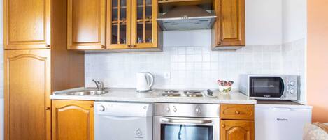 Apartment | Private kitchen | Dining tables