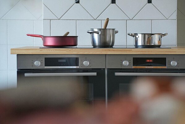A kitchen with two ovens and three pots on the countertop. - Chateau in Stavelot With Private Pool & Sauna (Stavelot)