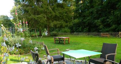 Regional House With Exposed Timber Frame Elements Full of Authenticity and Charm in a Green Area