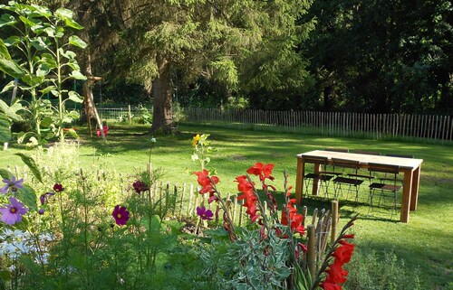 Regional House With Exposed Timber Frame Elements Full of Authenticity and Charm in a Green Area