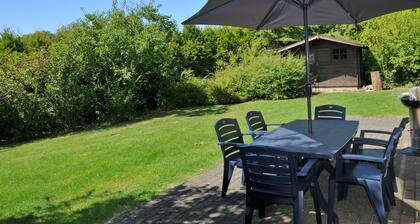 Holiday Home with Hot Tub & Steam Room in Forest