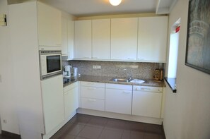 Appartamento | Cucina privata | Seggiolone