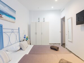 2 dormitorios, tabla de planchar con plancha, Internet y ropa de cama