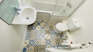 Bathtub, hair dryer, towels