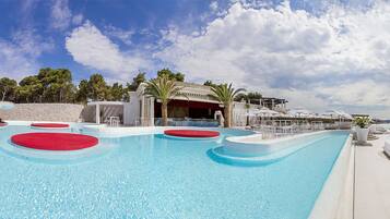 5 bars/lounges, poolside bar, beach bar