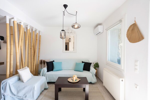 Appartement Majestueux | Coin séjour | Télévision