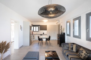 Grand Apartment, 2 Bedrooms, City View | Living area | TV