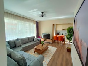 Royal Apartment | Living room | 102-inch LCD TV with satellite channels, TV - Lara Park Suites (Antalya)