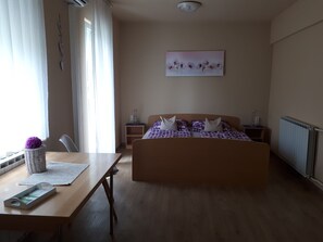 Doppel- oder Zweibettzimmer