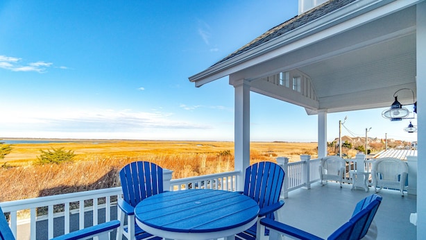 A covered porch with a view of a vast landscape. - Custom Single Family home with Expansive Bayfront views! (Wildwood Crest)