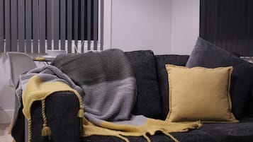 Family Apartment | Living area | Flat-screen TV