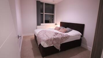 Comfort Apartment | Blackout curtains, iron/ironing board, bed sheets