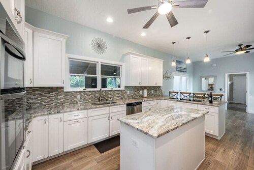 Waterfront Beauty: Sleeps 15, Heated Pool, Private Dock, Near Beach