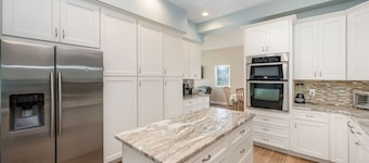 Waterfront Beauty: Sleeps 15, Heated Pool, Private Dock, Near Beach