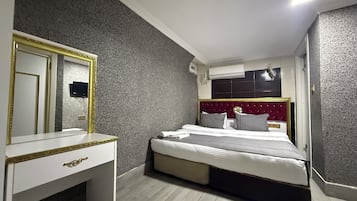 Economy Double Room, No Windows, Basement Floor | Minibar, soundproofing, free WiFi, bed sheets