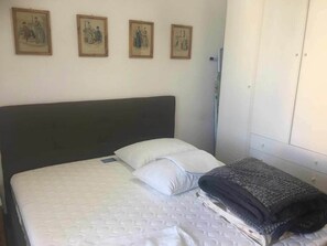 Apartamento, 3 quartos | 3 quartos, Wi-Fi de cortesia, roupa de cama