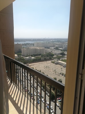 A cityscape with buildings, roads, and a parking lot. - Three Bedrooms Apartment Nile view Maadi (Maadi)