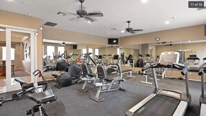 A gym with treadmills, elliptical machines, and weight benches. - Resort-like amenities and perfectly located Scottsdale condo (Scottsdale)