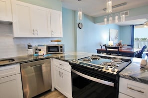 Condo, Multiple Beds (Compass Point 205) | Private kitchen | Cookware/dishes/utensils