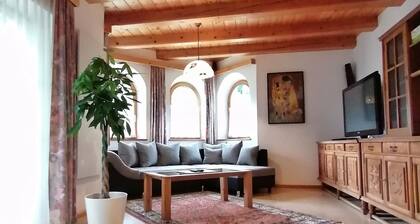 Spacious, sunny country house in the Alps with its own garden