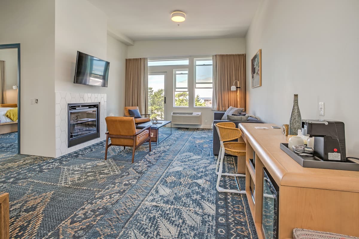 suite, 2 bedrooms with balcony | living area | 49-inch smart tv with cable channels, tv