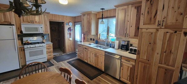 Coffee/tea maker, fridge, microwave, oven