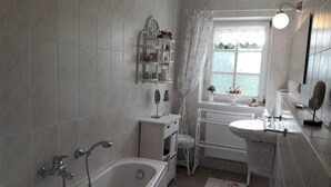 Bañera, secador de pelo