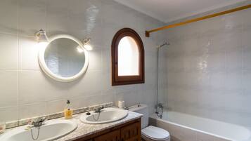 Combined shower/tub