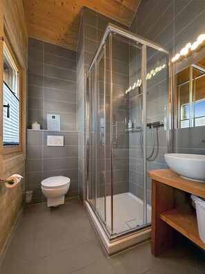 Bathtub, hair dryer, towels