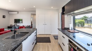 House, 4 Bedrooms, 2 Bathrooms | Private kitchen | Coffee/tea maker, full-sized fridge, microwave, oven - Burgundy Place (Martinborough)