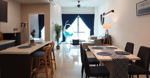 Comfort Apartment | Living area | LED TV, streaming services - Homesuite' Home at The Loft Imago (Kota Kinabalu)
