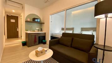 One-Bedroom Suite JIA#201 | Living area | 32-inch LED TV with digital channels, TV, Netflix