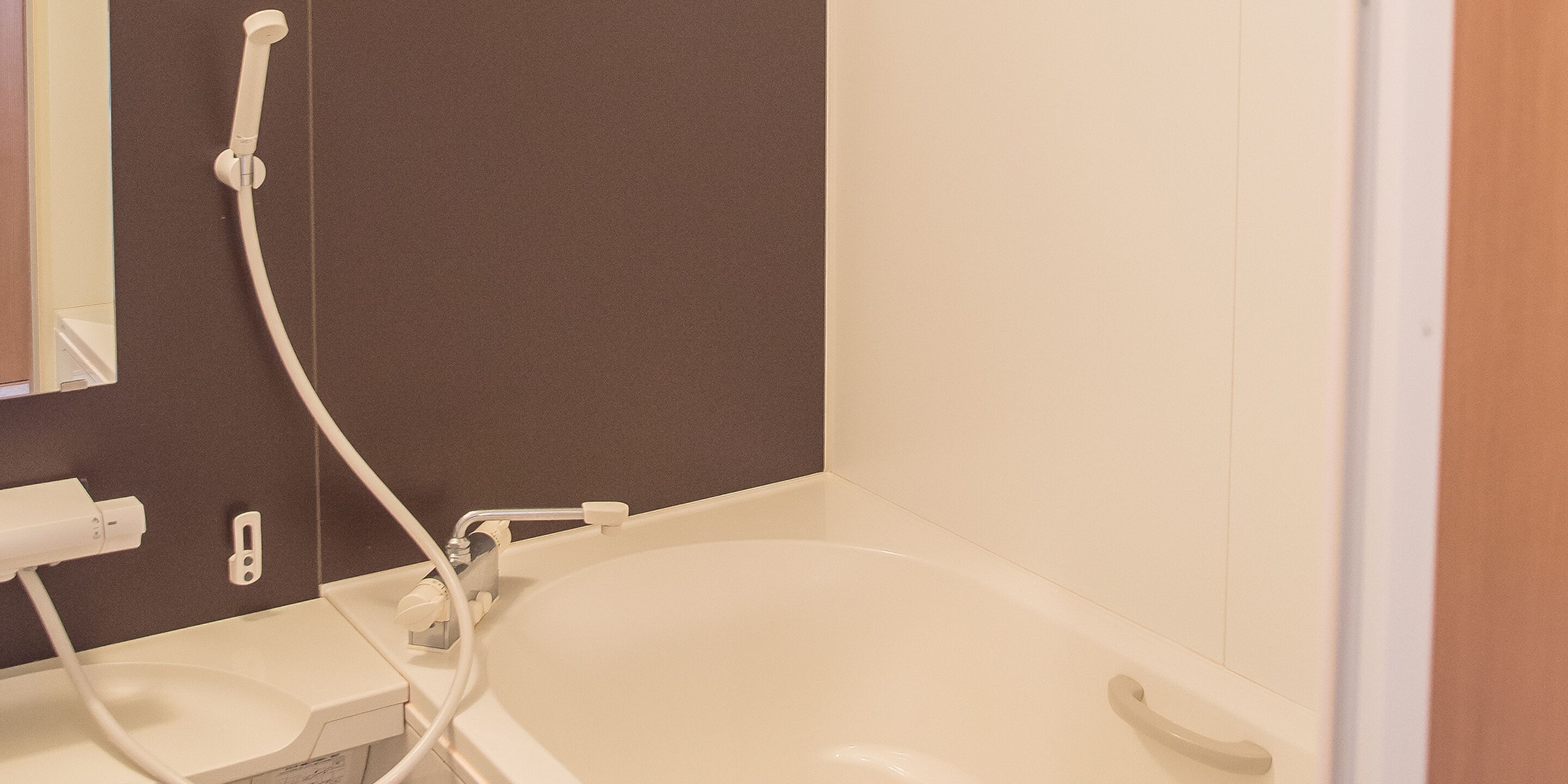 Separate bathtub and shower, free toiletries, hair dryer, slippers