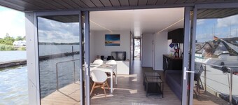 Houseboat Fjord Aries with roof terrace in Schleswig