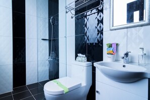 Shower, free toiletries, hair dryer, towels