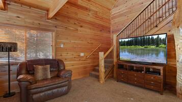 Chalet (3 Bedrooms) | Living area | Flat-screen TV, toys