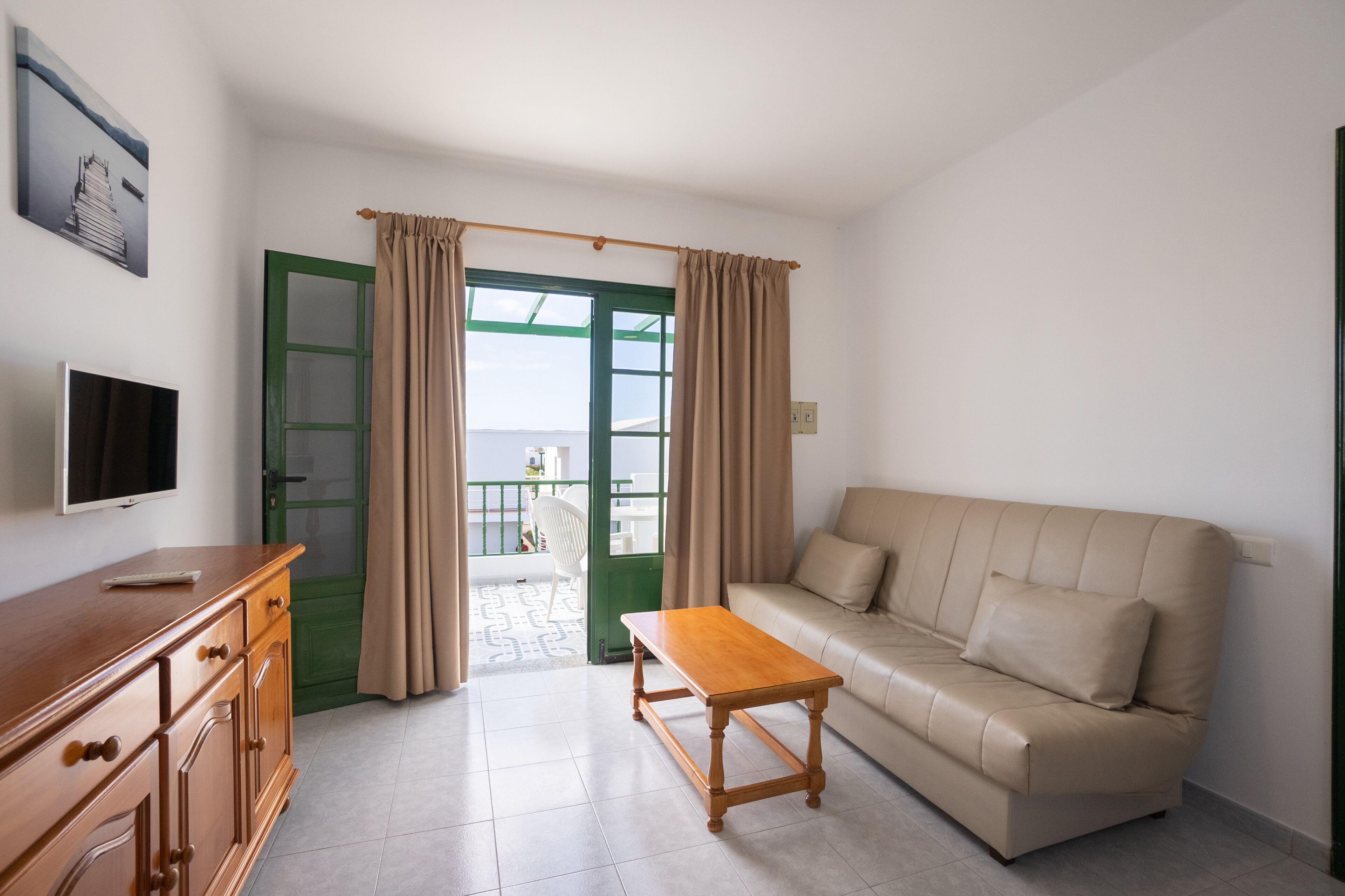 Standard Apartment, 1 Bedroom | Living area | 21-inch LCD TV with satellite channels, TV