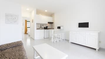 Standard Apartment, 1 Bedroom | Living area | 21-inch LCD TV with satellite channels, TV