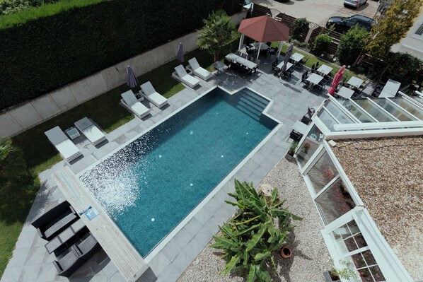 Outdoor pool, sun loungers