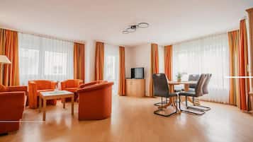 Apartment, 2 Bedrooms, Annex Building | Living area | 55-inch flat-screen TV with satellite channels, TV