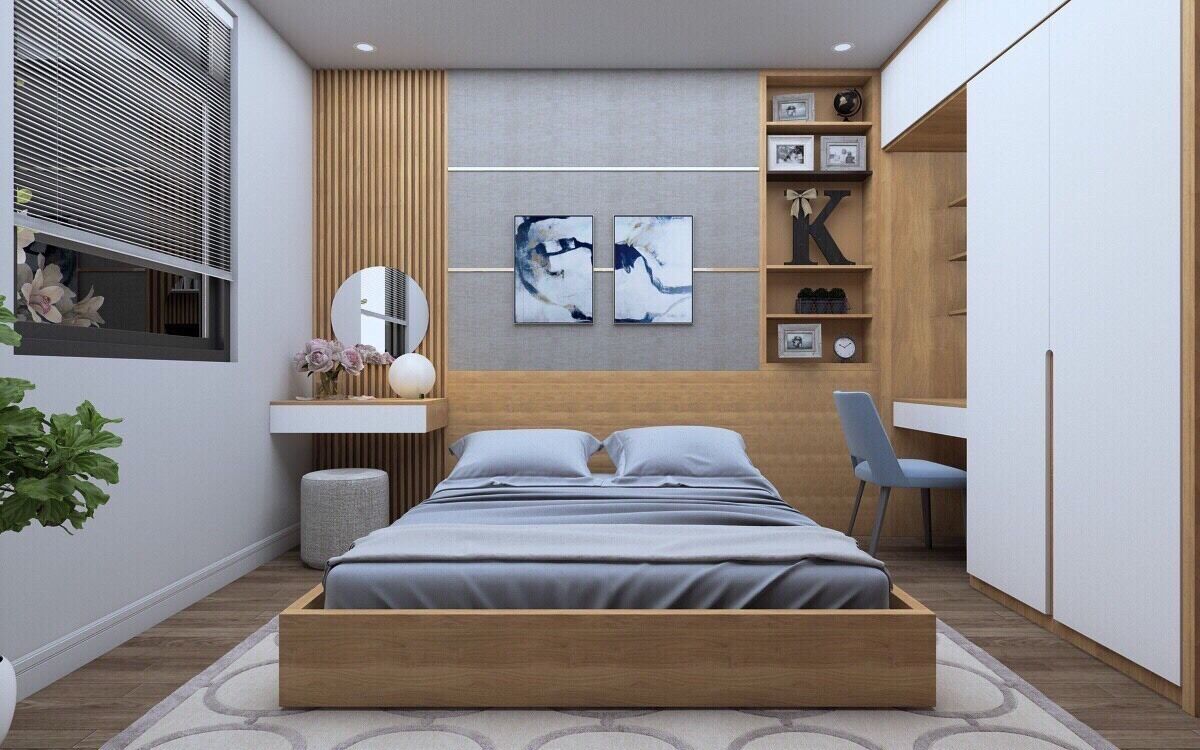 A modern bedroom with a wooden bed frame, a bedside table, a chair, and a built-in wardrobe.