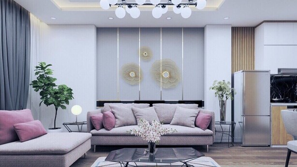 Een moderne woonkamer met een bank, salontafel en decoratieve wandpanelen.