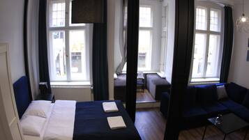 Departamento de diseñador | 1 habitación, cortinas blackout y tabla de planchar con plancha