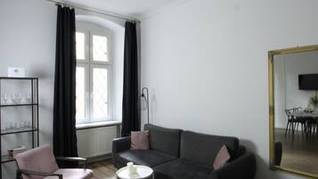 Design Apartment | Living area | Flat-screen TV